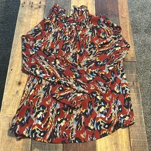 Rust pattern, mock neck blouse with button-down back